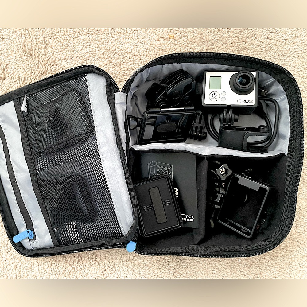 Out of box, never used GoPro Hero 3 with attachments and case